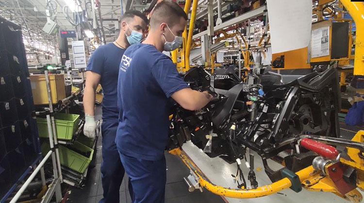 Workers on assembly line